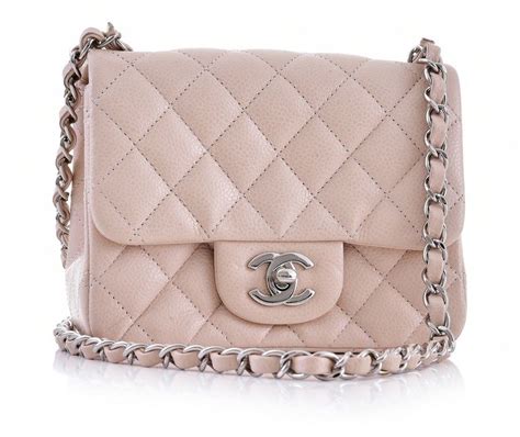 chanel quilted beige crossbody bag|Chanel quilted crossbody bag.